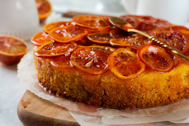 istock Candied red orange cake on a light background. Selective focus. 1255732582