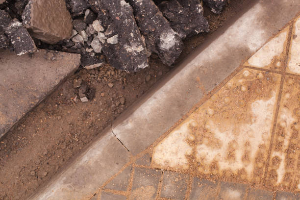 istock Asphalt after demolishing with jackhammer tool 1255733870