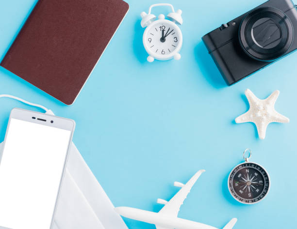 istock minimal model plane, airplane, starfish, compass, smartphone blank screen and face mask 1255735811