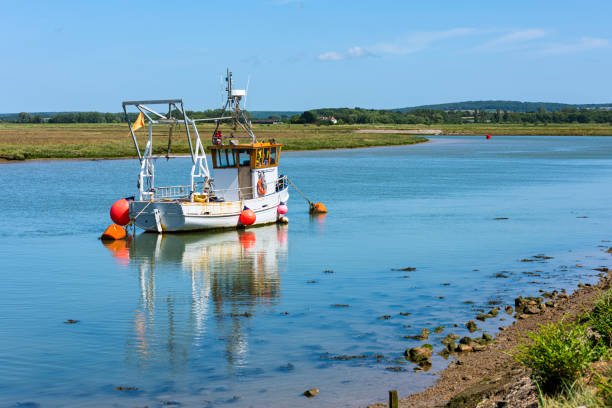 Fishing Boat on Faversham Creek in Kent, England stock photo