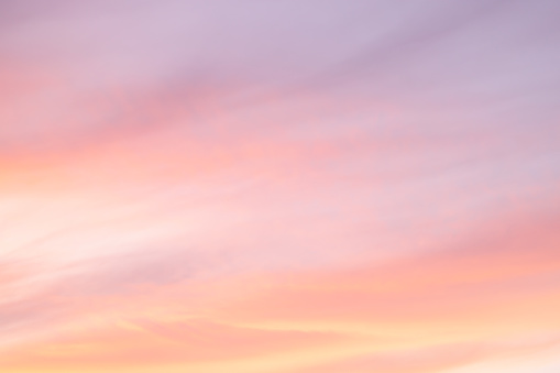 Pink sky background with white clouds. sky abstract background