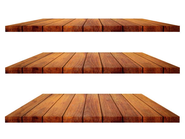 istock Empty wooden shelf isolated on white background. 1255744487