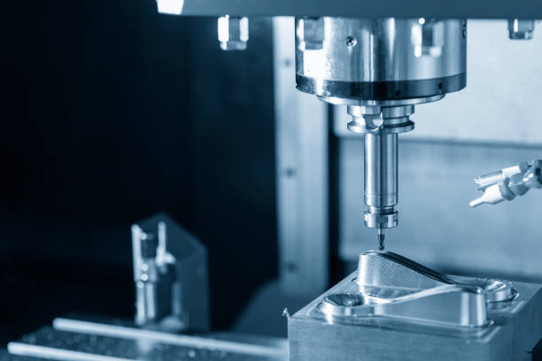 istock The  CNC  milling machine cutting  the mold parts by solid endmill tool. 1255745969