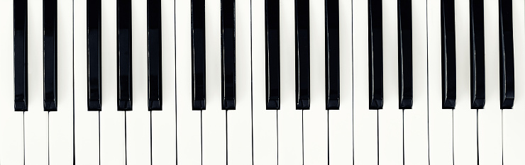 Black and white keyboard of a large concert  grand piano.Fragment