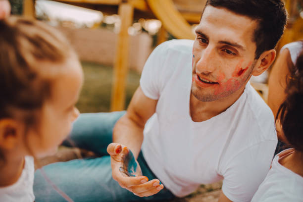istock Dad draws,play with his daughter in the yard 1255751477