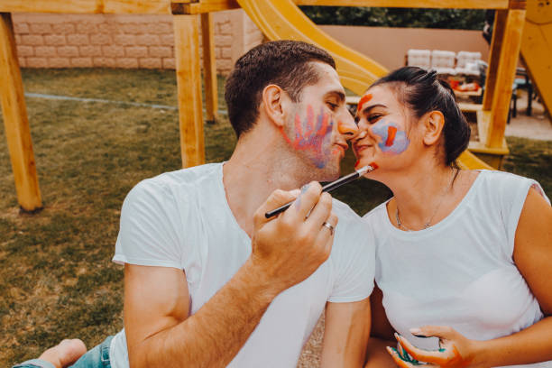 istock Loving couple painting 1255753614