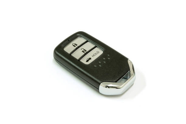 istock New car wave key with remote control on white background, isolated. 1255754896