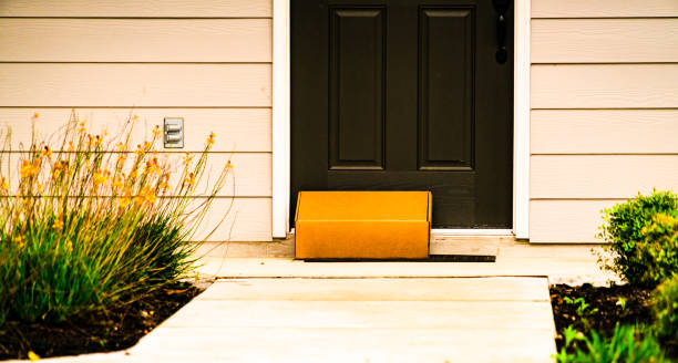istock Contactless Delivery Package Left at Front Door 1255756634