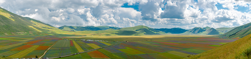 The month of July is the time of year during which the plateau of Castelluccio di Norcia is colored by the flowering of lentils