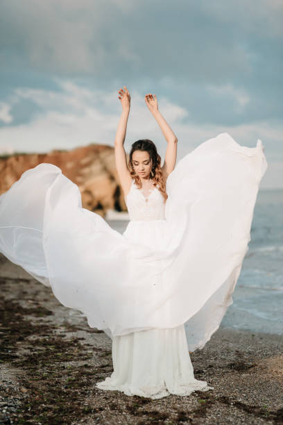 istock bride on the shore of the black sea 1255759280