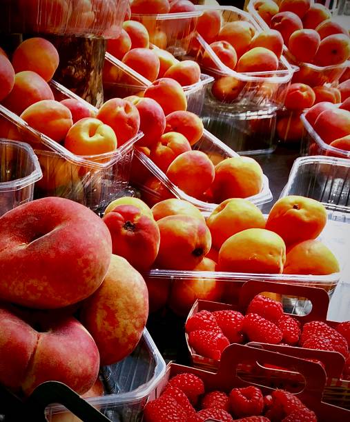 istock Fresh Raspberries Peaches and Apricots 1255762055
