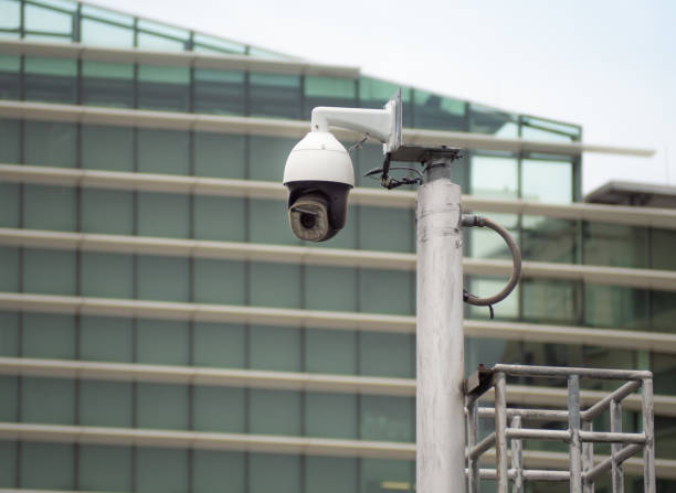 istock 360 Degree fish eye dome CCTV is installed on column in the city. 1255763403