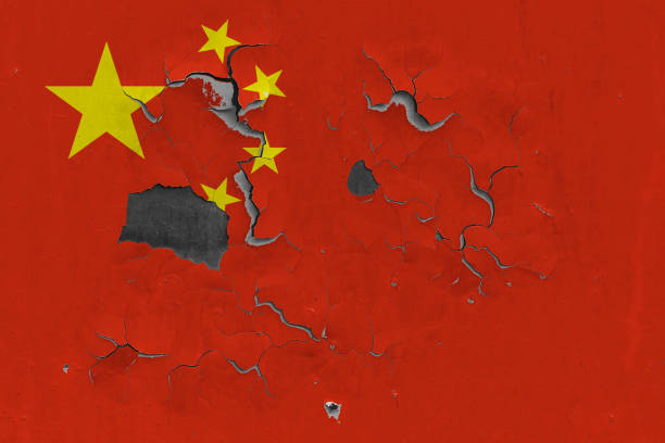 istock China flag close up old, damaged and dirty on wall peeling off paint to see inside surface. Vintage National Concept. 1255763499