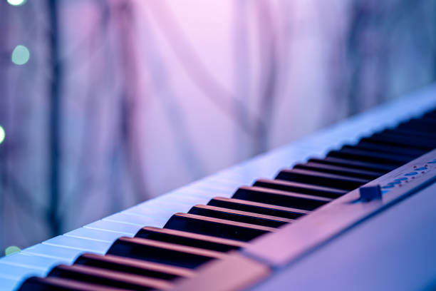 istock Piano keys on a beautiful colored background. 1255769879