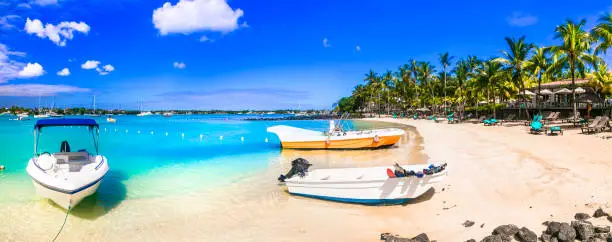 Photo of Tropical holidays - popular resort and beach of Grand Bay in Mauritius island