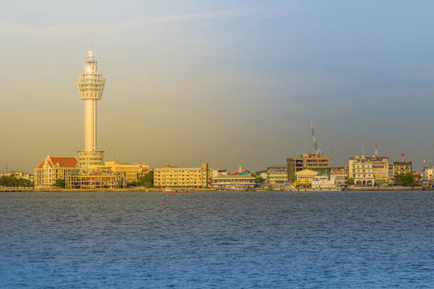 istock Riverfront view of Samut Prakan city hall with new observation tower and boat pier. Samut Prakan is at the mouth of the Chao Phraya River on Gulf of Thailand. 1255773814