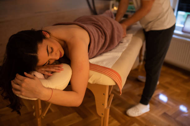 istock A woman relaxing during a leg massage 1255775616