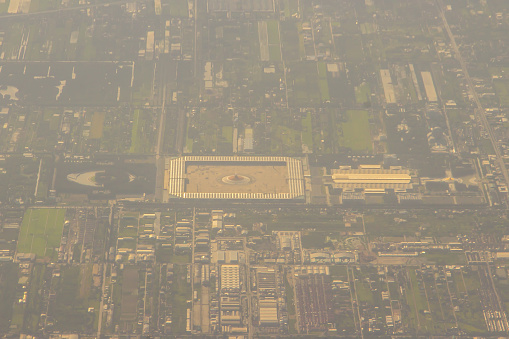 Aerial view from the airplane of Wat Phra Dhammakaya, a Buddhist temple (wat) in Khlong Luang District, in the Pathum Thani Province north of Bangkok, Thailand. It was founded in 1970.