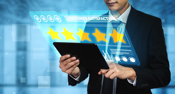 Customer review satisfaction feedback survey concept. User give rating to service experience on online application. Customer can evaluate quality of service leading to reputation ranking of business.