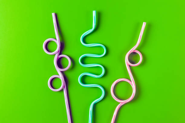 istock tubes for drinks on a green background macro. place for the label 1255776142