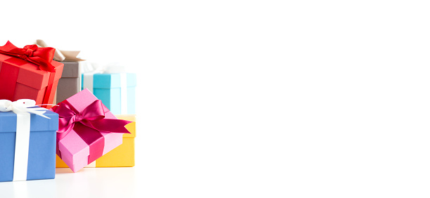 Multicolored gift boxes on pure white background.