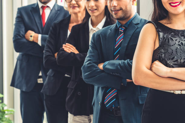 istock Successful business people standing together 1255784485