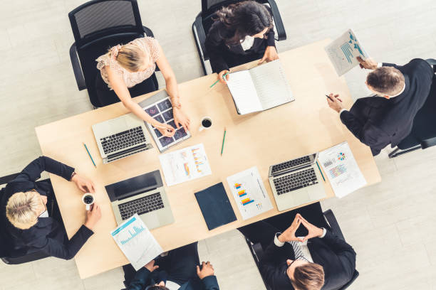 istock Business people group meeting shot from top view 1255785729
