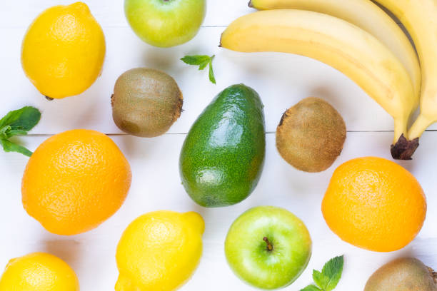 istock Juicy, fresh and bright fruits on a white background. 1255792926