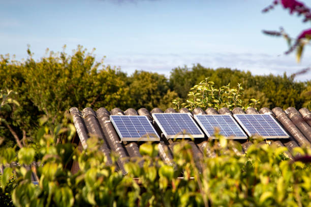 istock solar panels on a small house roof 1255793631
