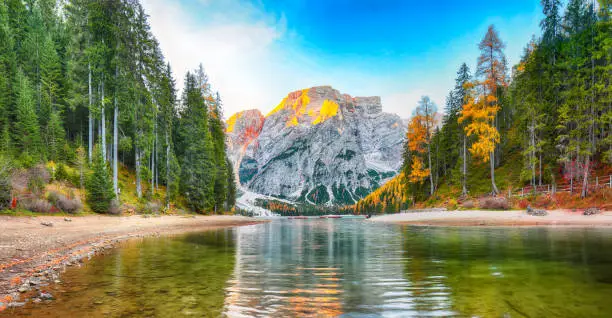 Photo of Amazing scenery of famous alpine lake Braies at autumn