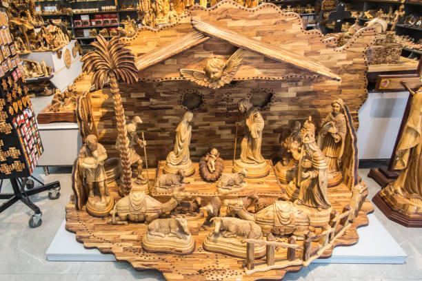 Wooden nativity scenes for sale at the Christmas market set up in the old town of Galway, Ireland.