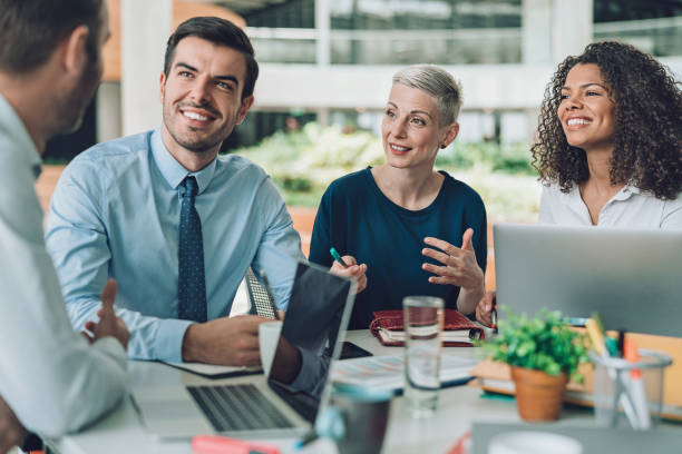 istock Business professional talking to the senior management 1255800103