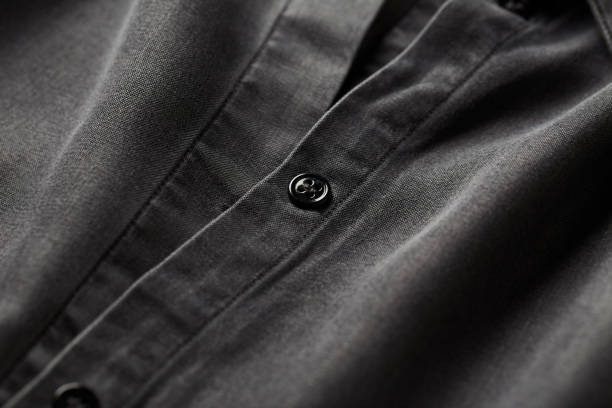istock Close up of dark Men's shirt. 1255801608
