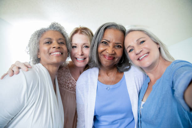 istock Senior friends take selfie together 1255802804