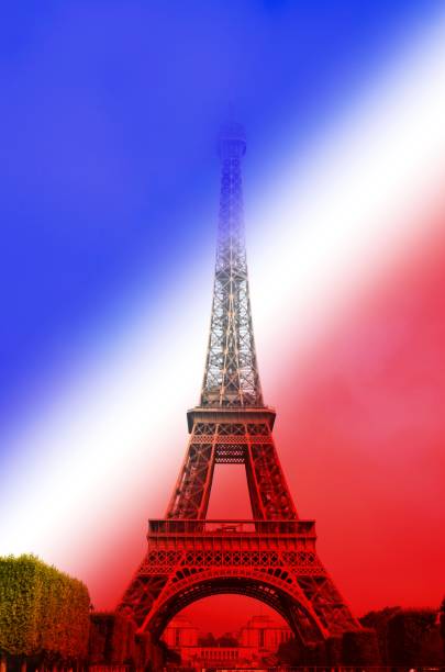 istock Eiffel Tower with blue, white, and red French Flag background 1255806584