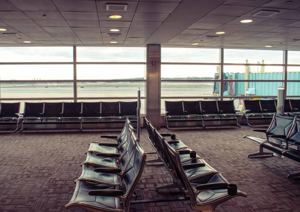 istock Empty airport seats in waiting terminal 1255807861