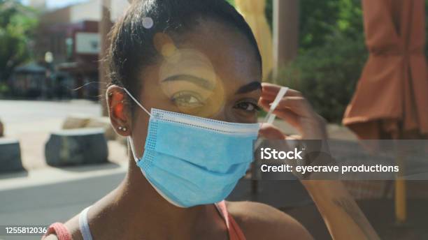 Young Adult Generation Y African American Female With Mask In Western America Small Town Series Stock Photo - Download Image Now