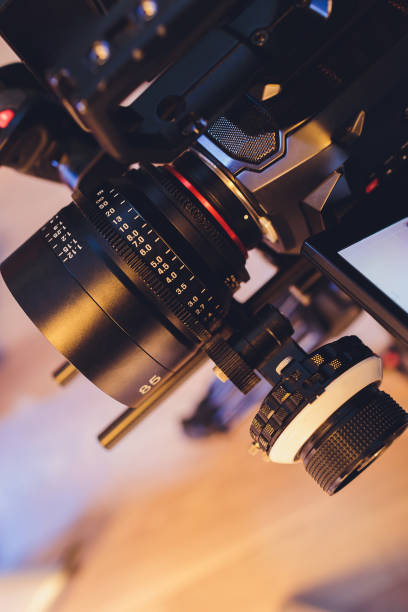 istock Video operator shoots on camera. Video camera with a transmitting device over Wi-Fi. Video production. Videographer in headphones. Video stream. 1255814417