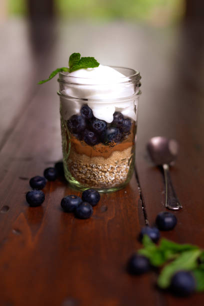 istock Fresh blueberries in a jar overnight cinnamon oatmeal 1255816221