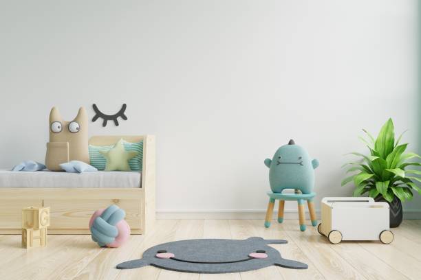 istock Mock up posters in child room interior, posters on empty white wall background. 1255817012