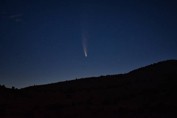 neowise comet technically known as c/2020 f3, rising on the horizon in utah, united states, taken just before dawn on july 12, 2020, from the simpson springs pony express trail station in the west desert by salt lake city. usa. - pony express imagens e fotografias de stock