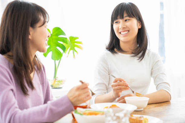 istock asian parent and daughter 1255822579