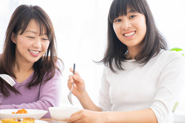 istock asian parent and daughter 1255822651