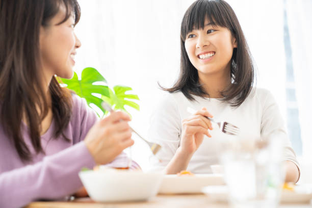 istock asian parent and daughter 1255822672