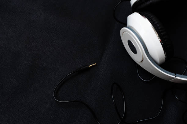 istock Close up headphones on balck background. 1255825719
