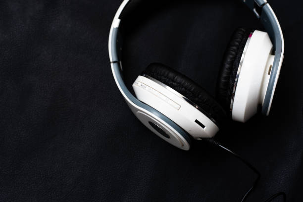 istock Close up headphones on balck background. 1255826281