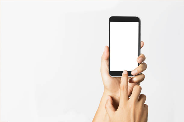 istock hand holding black phone isolated on white clipping path inside 1255829447