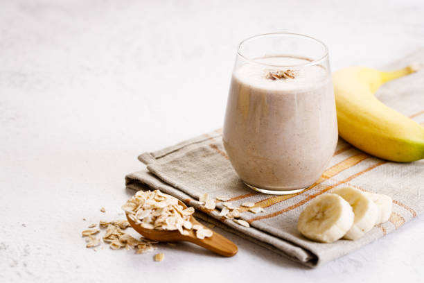 istock banana and oatmeal smoothie in a glass 1255830341