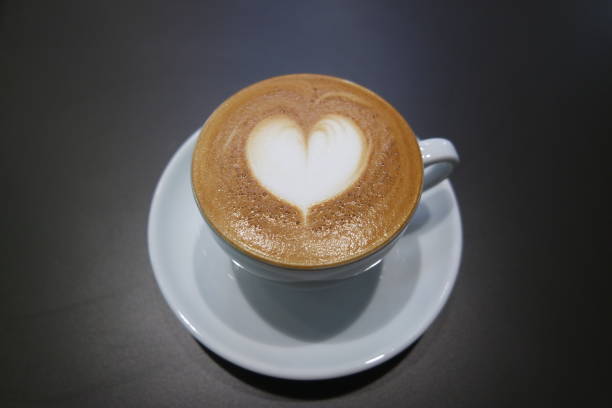 istock Coffee with heart shape latte art 1255831379