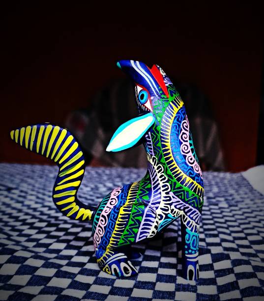 It´s a handcraft made in Mexico, a wooden pieced carved into a a fantastic animal with colorful tones and fictional shapes. .